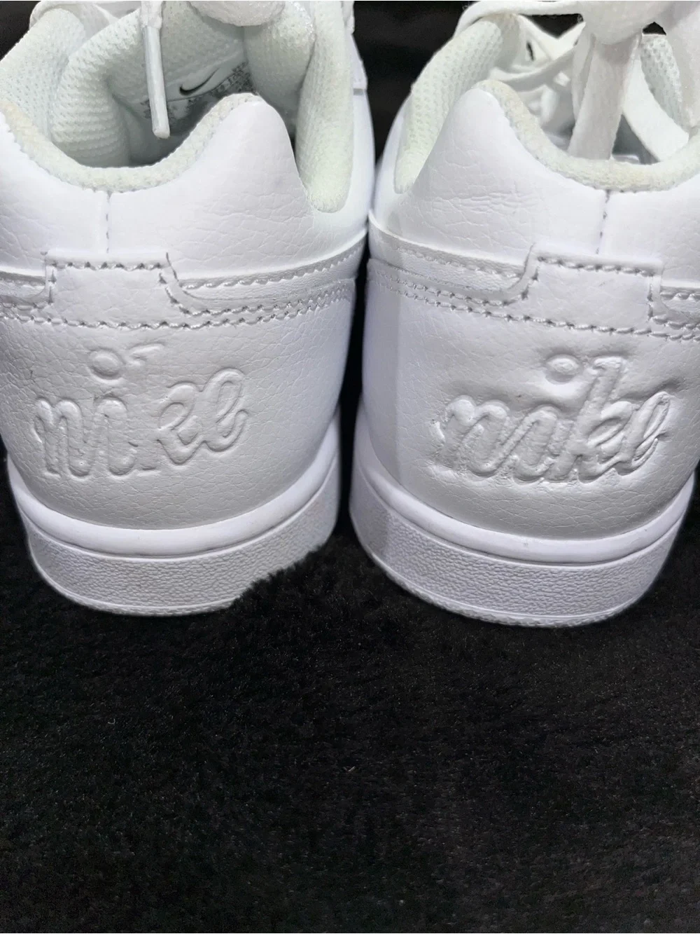 Nike White Sneakers with white Swoosh